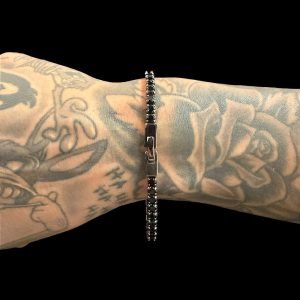 PULSEIRA RIVIERA PEDRAS PRETAS - BANHADO A OURO NEGRO